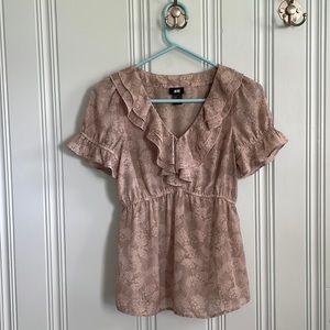 H&M blouse, size 2. Gently worn and in good condition.